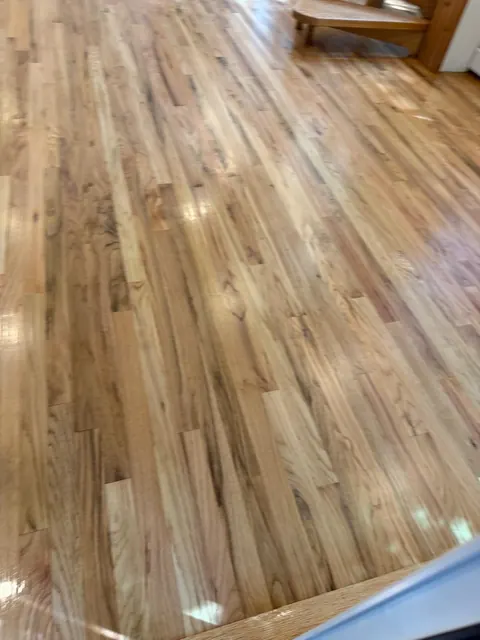 Close-up of a refinished red oak floor with a satin finish