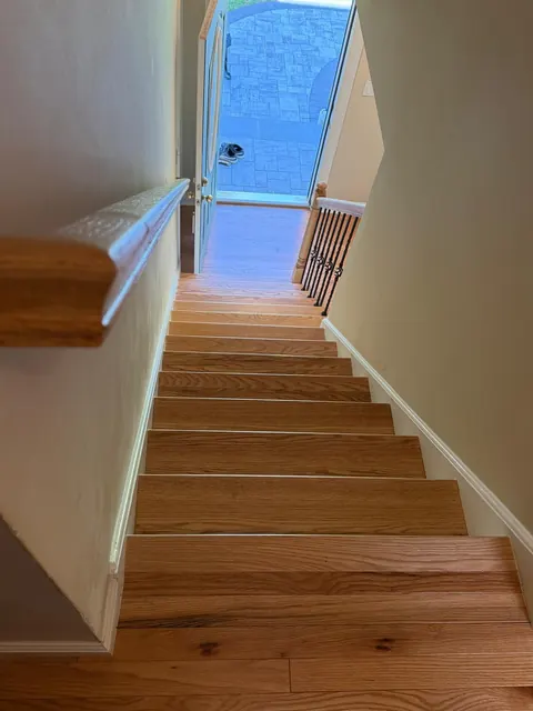 Staircase with natural oak treads seen from the top