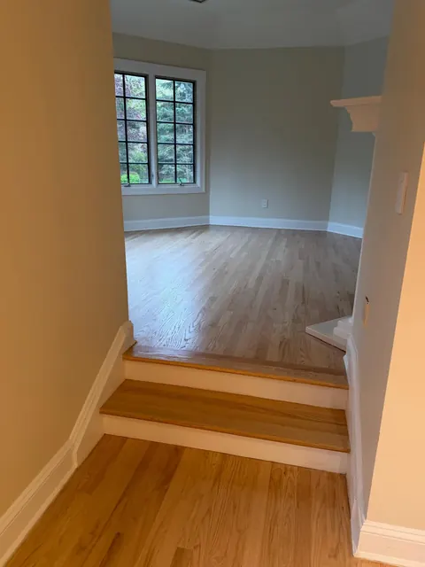 Step-up into a room with a natural white oak floor